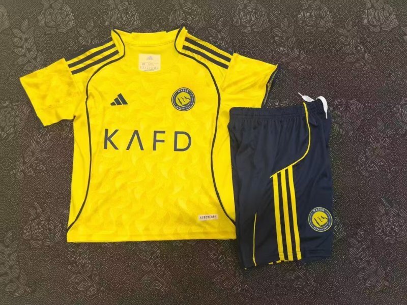 MAGLIA + PANTALONCINO AL NASSR HOME BIMBO 25/26