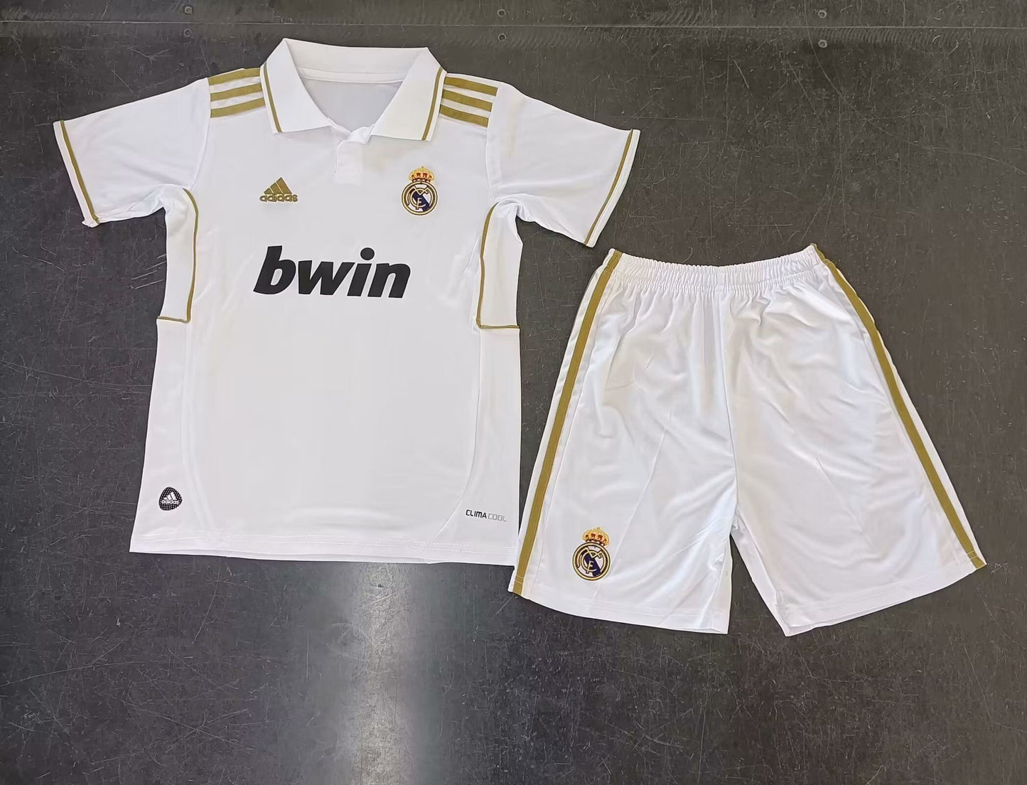MAGLIA + PANTALONCINO BIMBO REAL MADRID HOME 11/12