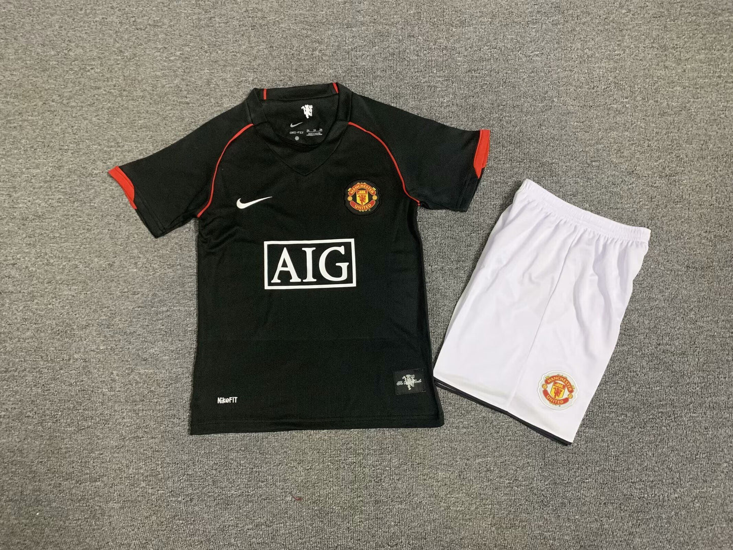 MAGLIA + PANTALONCINO BIMBO MANCHESTER UNITED AWAY