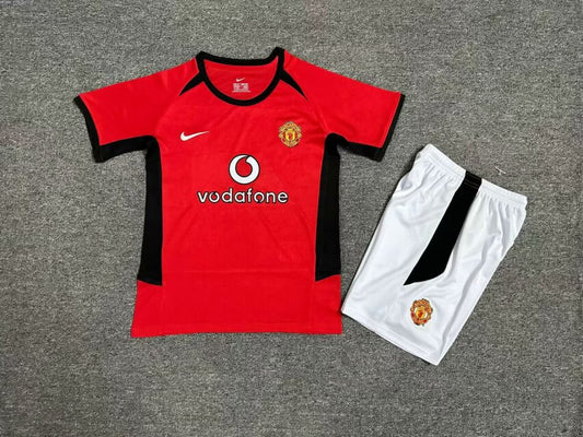 MAGLIA + PANTALONCINO BIMBO MANCHESTER UNITED 02/04