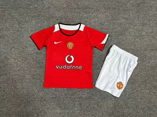 MAGLIA + PANTALONCINO BIMBO MANCHESTER UNITED HOME 04/06