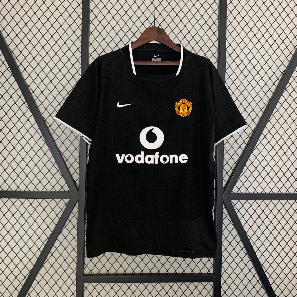 MU AWAY 03/04